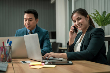 Modern Asian businessman with high confidence Committed to working together as a harmonious team Having a professional planning meeting at the company