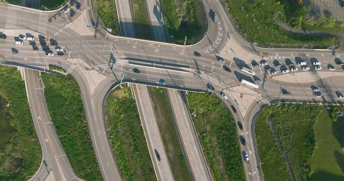 Aerial, drone, early morning or afternoon video of a diverging diamond interchange (DDI), located in Woodbury, NY.	