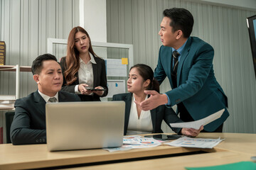 Modern Asian businessman with high confidence Committed to working together as a harmonious team Having a professional planning meeting at the company