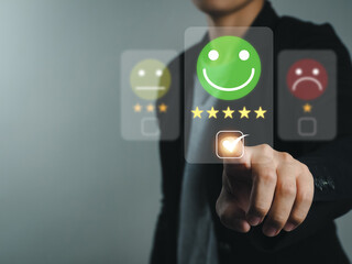 Business rating experience through Online application, satisfaction survey concept Businessman who chooses a business satisfaction rating of five stars.