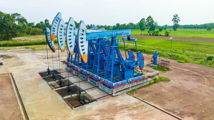 Top view In the field crude oil country industry the oil rig pump in the evening of the pumping unit