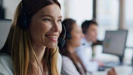 Telemarketing team working office together. Smiling woman specialist consulting