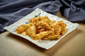 Georgian khachapuri with cheese in a plate
