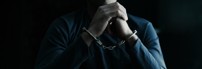 Fototapeta na wymiar man hand handcuffs