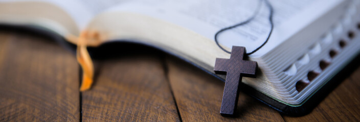cross on open Bible
