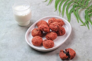 red velvet soft cookies serve on a white plate