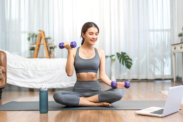 Fototapeta na wymiar Portrait of asian slim fit strength woman training in sportswear sitting relax and practicing yoga, fitness, exercise, wellness, workout, sport with blue fitball at home.Diet concept.Fitness, healthy