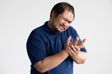 middle aged old asian man suffering from trigger finger, cps or carpal tunnel syndrome, gout...