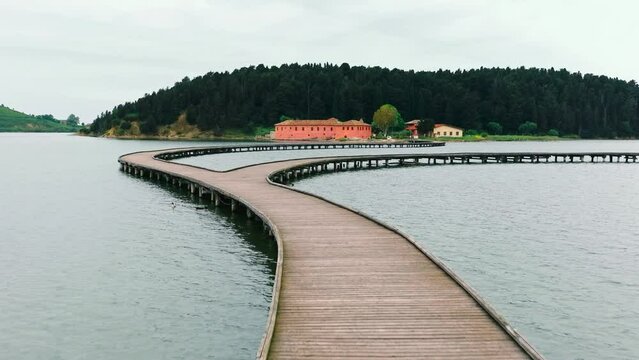 Drone aerial view on isolated Monastery of Saint Mary on Zvernec island. Narta Lagoon, Vlore, Albania
