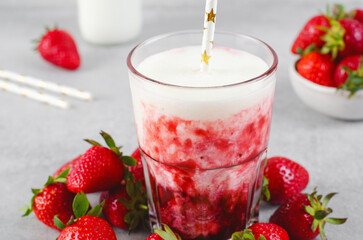 Korean Strawberry Milk, Strawberry Milkshake with Pureed Fresh Berries, Refreshing Drink on Bright Background