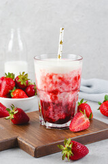 Korean Strawberry Milk, Strawberry Milkshake with Pureed Fresh Berries, Refreshing Drink on Bright Background
