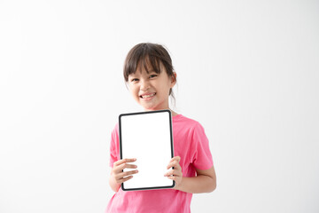 smiling girl hand pointing at tablet isolated and white background