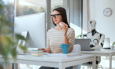 Woman and robot working in the office