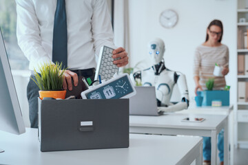 The impact of AI on jobs: fired business people leaving the office