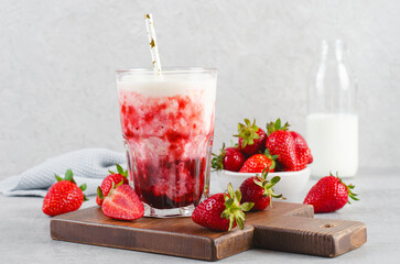 Korean Strawberry Milk, Strawberry Milkshake with Pureed Fresh Berries, Refreshing Drink on Bright Background