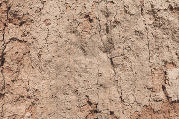 Abstract background. Clay sandy soil. Organic texture of the ground on the sea coast, close up. - 609957921