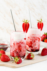 Korean Strawberry Milk, Strawberry Milkshake with Pureed Fresh Berries, Refreshing Drink on Bright Background