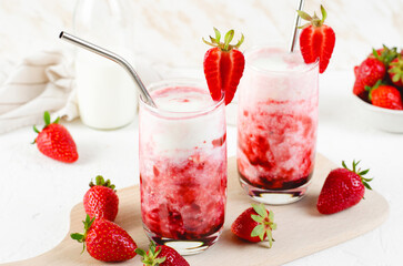 Korean Strawberry Milk, Strawberry Milkshake with Pureed Fresh Berries, Refreshing Drink on Bright Background