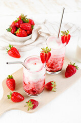 Korean Strawberry Milk, Strawberry Milkshake with Pureed Fresh Berries, Refreshing Drink on Bright Background