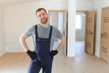 Builder on construction site. Manufactured Home News, modular home, conventional housing. Builder...