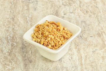Crunched roasted peanut in the bowl