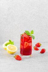 Strawberry Drink, Refreshing Summer Cocktail, Lemonade, Iced Tea, Red Cold Drink on Bright Background