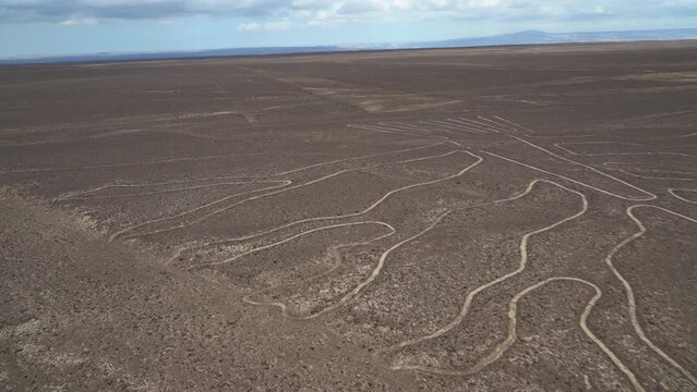 the famous nazca lines in the desert of Peru are a popular travel destination and still an unsolved mystery.