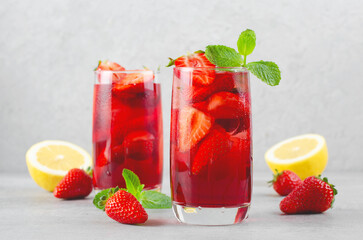 Strawberry Drink, Refreshing Summer Cocktail, Lemonade, Iced Tea, Red Cold Drink on Bright Background
