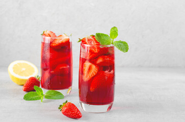 Strawberry Drink, Refreshing Summer Cocktail, Lemonade, Iced Tea, Red Cold Drink on Bright Background