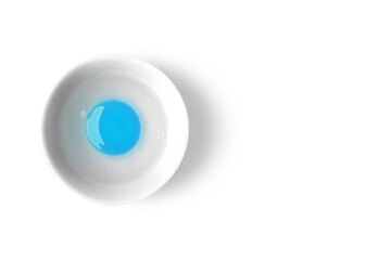 Blue Egg Yolk On A White Bowl - Flat Lay View - Top View