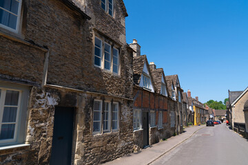 Lacock Wiltshire England UK quaint village street in tourist destination near Chippenham 