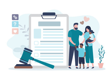 Happy multiethnic family, parents with two children. Love couple with kids standing near adoption agreement. Adoption application and gavel. Adoption papers laid out ready for completion.