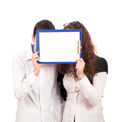 schoolchildren, a girl and a boy are holding a tablet with a blank page, space for text