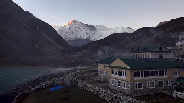 Gokyo village hut at sunset with cho you, Nepal 
Himalaya mountain peak and clear sky, 2023

