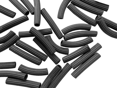 close up of  a black pasta on white background with clipping path