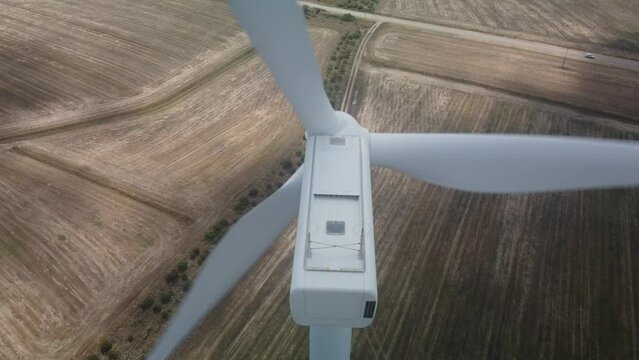 wind turbine in the foreground in the medio campidano wind farm in southern sardinia
