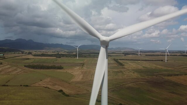 wind turbine in the foreground in the medio campidano wind farm in southern sardinia
