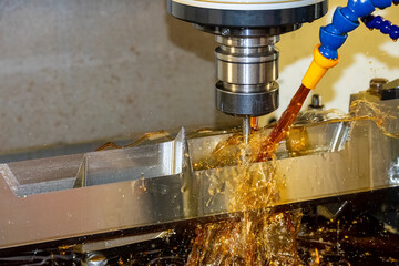 The CNC milling machine cutting the tire mold parts.