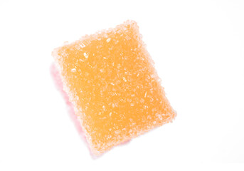 sugar coated jelly with beautiful colors on white background with copy space