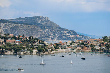 Fototapeta na wymiar View of Villefranche sur Mer and the beginning of the Saint Jean Cap Ferrat peninsula on the French Riviera