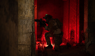 Soldier in anti-terrorist warfare in a dark building, Anti-terrorist operation training on the battlefield