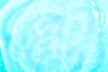 Obraz premium Cosmetic gel, serum transparent sample. Liquid cream with bubble texture. Gel texture of a cosmetic product. Clear liquid lotion for skin care.