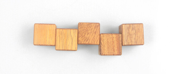 Wooden cube with the letter from the mvp word