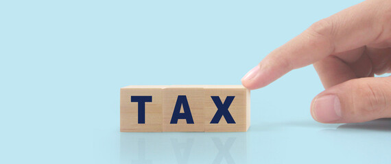 Wooden cube in hand with the letter from the mvp word