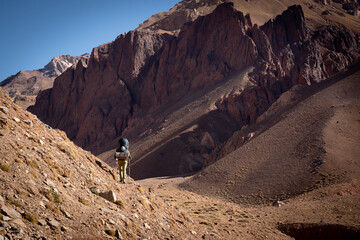 Hiker in the andes mountains. Mendoza, Argentina