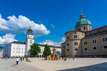 huge Residenzplatz main square in Salzburg with dome and fountain