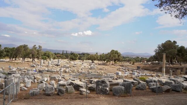 View of ancient Greek ruins in Turkey. Old monument sightseeing landmark stones in Theos open-air museum.