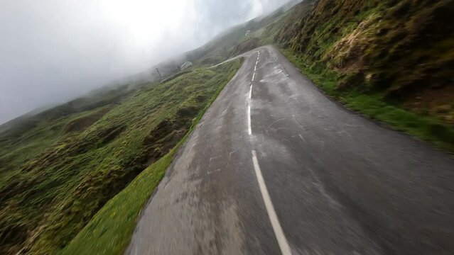 Flying over a road at the col d'aubisque in France.