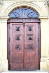 Wooden door of St. Mary's Basilica in the main Market Square in Krakow, Poland