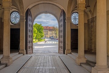 Fototapeta premium View through a historical archway of a Middle Ages castle
